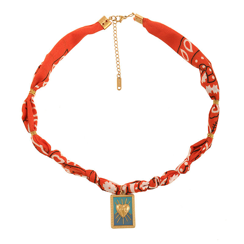 LUCKY KNOT BANDANA CHARM NECKLACE