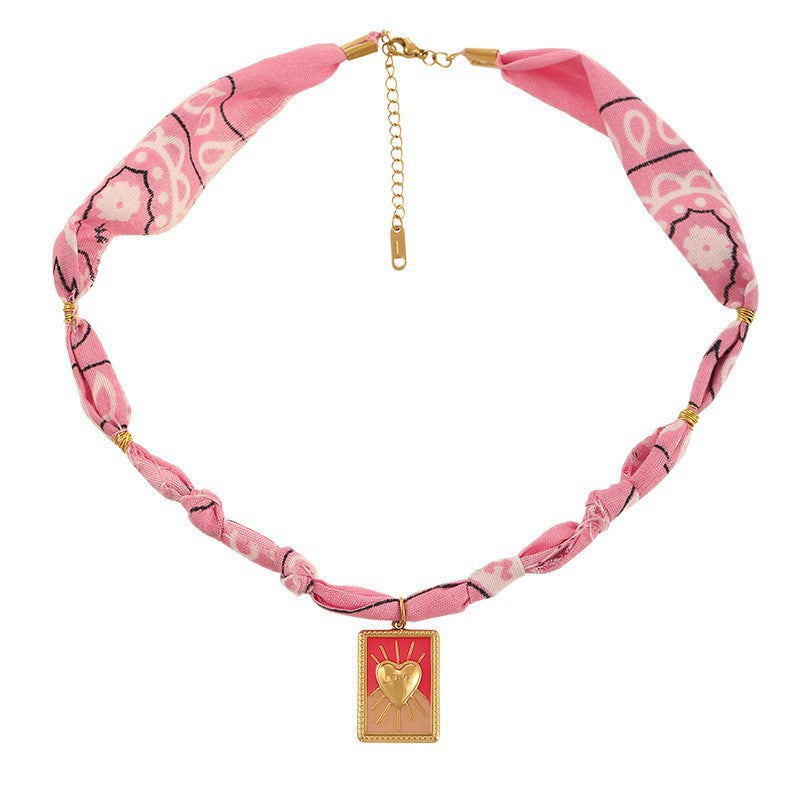 LUCKY KNOT BANDANA CHARM NECKLACE